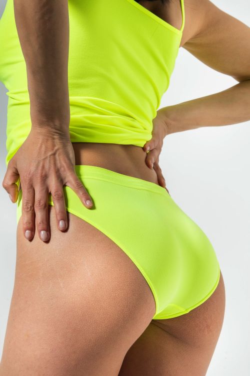 Slip a Vita bassa Microfibra tecnologia SEAMLESS con tassello RISALTI Colore giallo fluo